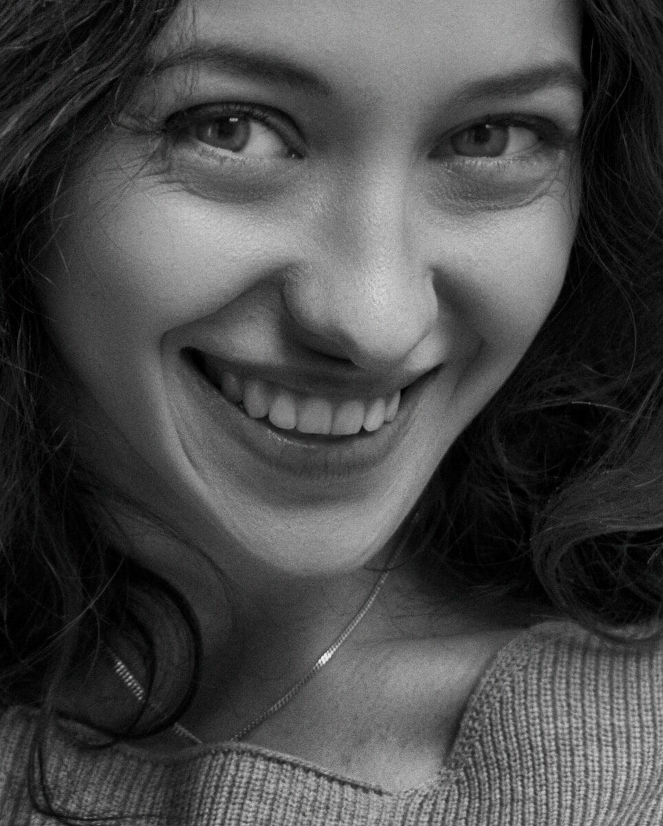 a woman smiling for the camera